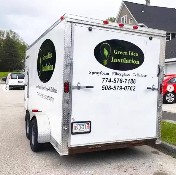 The Green Idea Insulation trailer, carrying the company name and contact numbers